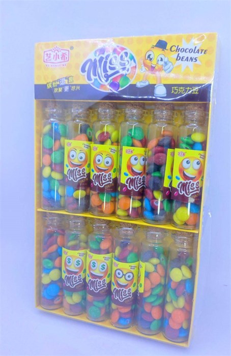 Драже "YI XIAO XI" в стеклянной колбе ШОКОЛАДНОЕ В ГЛАЗУРИ 12 гр. 12 шт. уп. (0162) 02198